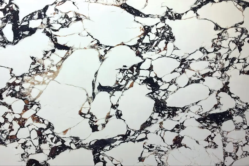 Calacatta Viola Noir, shown as a flat sample